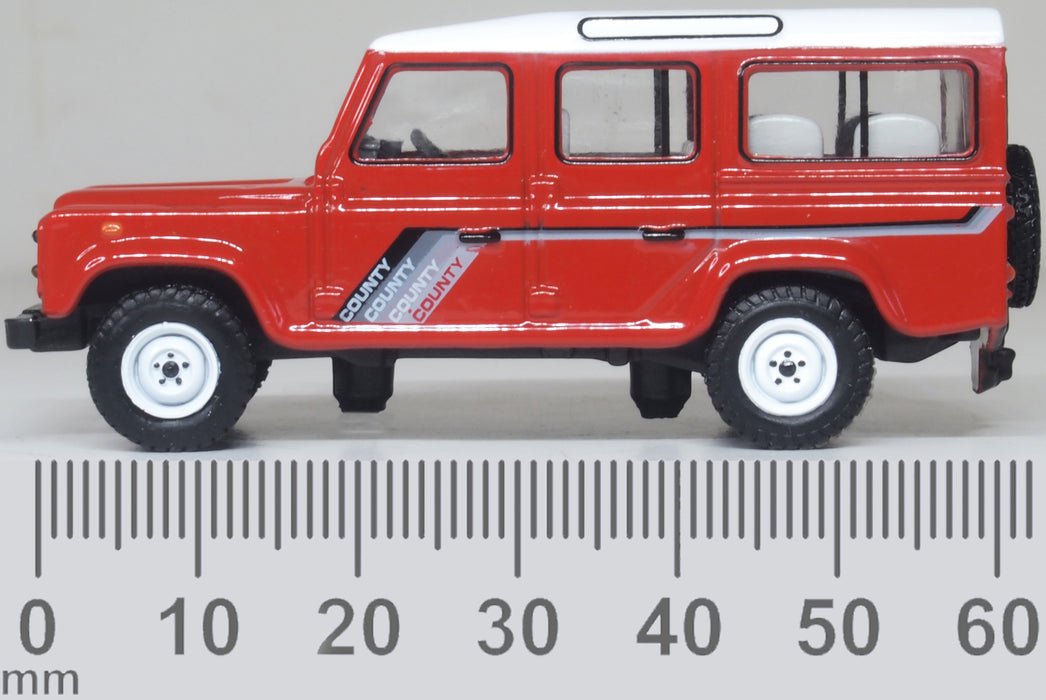 Oxford Diecast 76DEF018 Land Rover Defender LWB St. Wagon Masai Red - 1:76 Scale - Phillips Hobbies