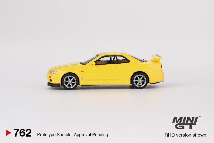 Mini GT Nissan Skyline GT - R (R34) V - Spec Lightning Yellow (RHD) - 1:64 Scale - Phillips Hobbies