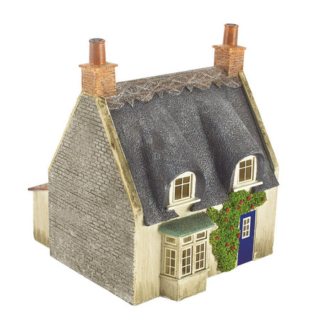 PRE - ORDER: Bachmann Scenecraft Thatched Cottage Grey Stone & Blue Door - OO Gauge - Phillips Hobbies