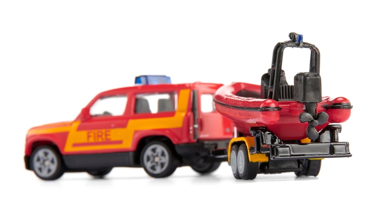 Siku 1608 Land Rover Defender With Boat Fire Service Toy Model - Phillips Hobbies